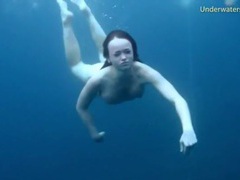 TubeHardcore presents: Three ladies get naked swimming in the ocean