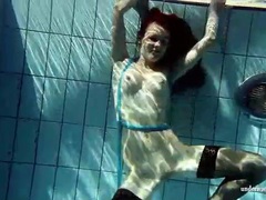 TubeHardcore presents: In black stockings pretty girl goes for a swim
