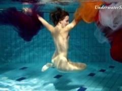 TubeHardcore presents: Artful naked underwater show with a hairy pussy girl